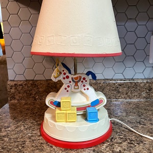 Lampara musical fisher price sale