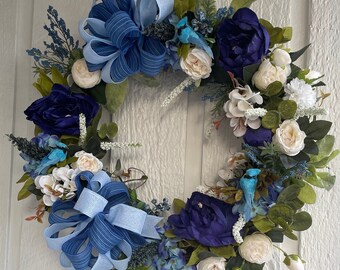 Gorgeous blue and cream Mother’s Day wreath with baby bluebirds!!