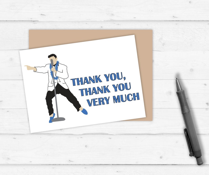 May include: A white card with a cartoon illustration of a person singing into a microphone. The text on the card reads "Thank you, thank you very much".