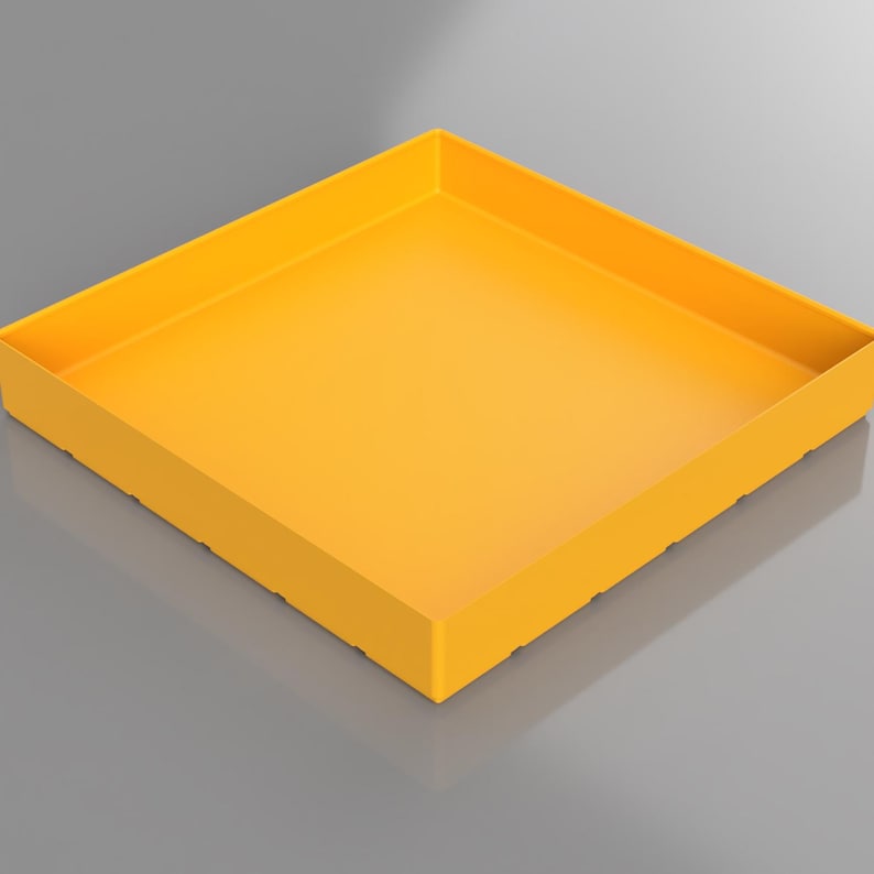 May include: A bright yellow, square tray with raised edges. The tray is made of a solid material and has a smooth, matte finish. The design is simple and modern, suitable for various uses.