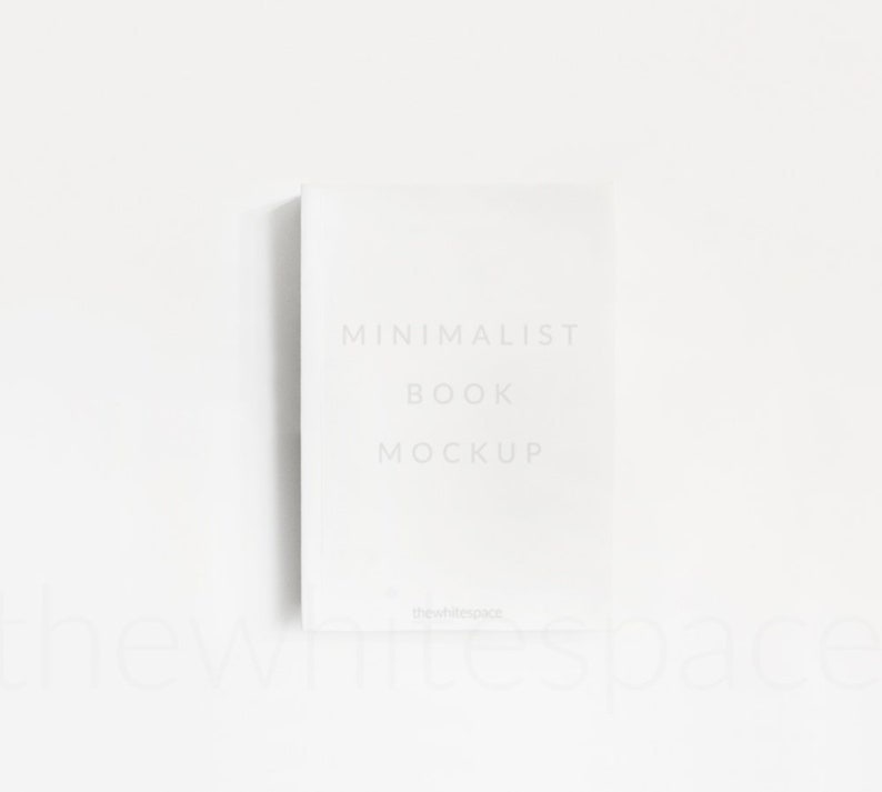 May include: A white book mockup with the text "MINIMALIST BOOK MOCKUP" and the website "thewhitespace" at the bottom.
