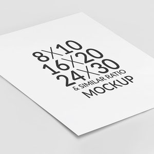 May include: A white sheet of paper with black text that reads "8x10, 16x20, 24x30 & similar ratio MOCKUP".
