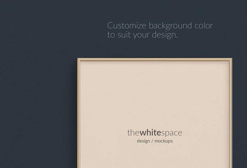 May include: A light beige mockup frame with a gold border, against a dark blue background. The frame has the text "thewhitespace design / mockups" at the bottom.