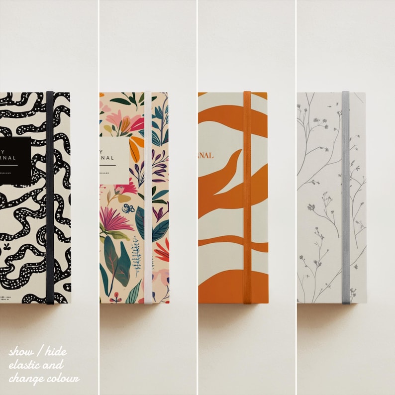 May include: Three different patterned journals with elastic closures. The journals have a black and white pattern, a floral pattern, and an orange and white pattern.