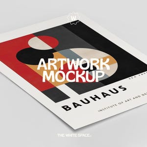 May include: A white poster mockup with a geometric design in red, black, yellow, and white. The text "ARTWORK MOCKUP" is in bold, white letters. The text "BAUHAUS" is in black letters. The text "INSTITUTE OF ART AND DESIGN" is in black letters. The text "THE WHITE SPACE." is in black letters at the bottom of the poster.