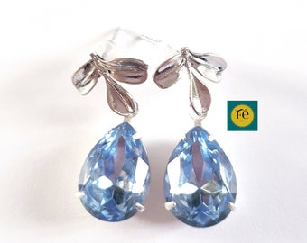 Blue Art Deco earrings, Faceted glass teardrop pendant Clear sapphire matte silver finish, Rhodium finish leaf stud earring.