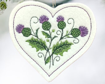 Scottish Thistle in a Heart Shaped Ornament Embroidered on White Felt with 2 Purples and 2 Greens. Beautiful colors and dimension.