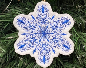 Intricate Snowflake Ornament Embroidered on White Felt with Blue Thread. Available in any color combo you would like, just ask!