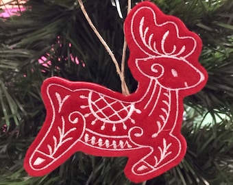 Red and White Reindeer Ornament Embroidered on Felt.