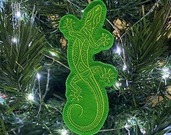 Gecko Lizard Ornament Embroidered on Apple Green Felt with a Medium Green Thread. Southwest Gecko is 5.75" Long by 2.35" Wide.