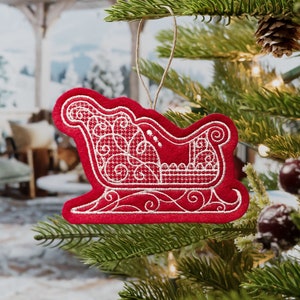 Elegant Christmas Sleigh Ornament Embroidered on Red Felt with White Thread. Gingerbread style Winter Sleigh Ornament.