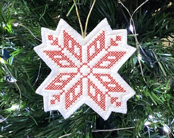 Cross Stitch Nordic Star Ornament Embroidered on White Felt with Red Stitching. Scandinavian Holiday Decor.