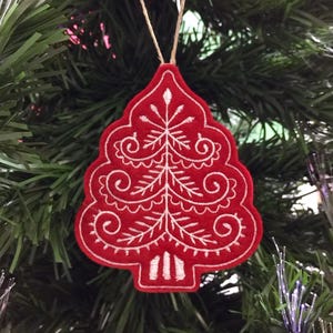 Red and White Christmas Tree Ornament Embroidered on Felt.