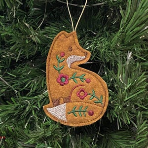 Swedish Folk Art Fox Ornament. Nordic Fox Embroidered on Reddish Brown Felt with Dark Brown, Deep Green and Dark Pink Threads. Woodland Gift