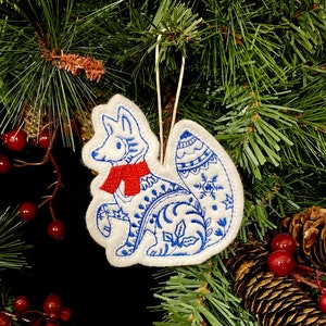 Winter Fox Ornament Embroidered on White Felt with Blue Accents and a Red Scarf. Polar Fox with Folk Art Designs. image 2