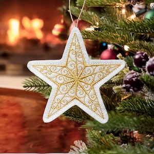 Magical Star Ornament Embroidered on White Felt with Gold Thread. Ornate Layered Design with Swirls and Satin Stitches.