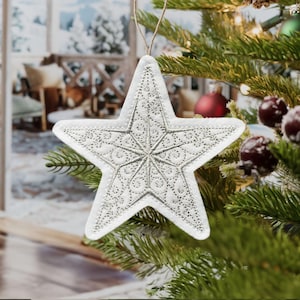 Magical Star Ornament Embroidered on White Felt with Silver Thread. Ornate Layered Design with Swirls and Satin Stitches.