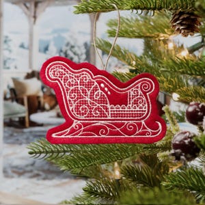 Elegant Christmas Sleigh Ornament Embroidered on Red Felt with White Thread. Gingerbread style Winter Sleigh Ornament.