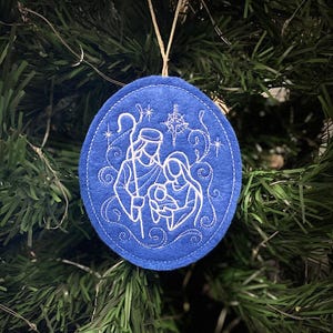 Mary, Joseph and Baby Jesus Ornament Embroidered on Blue Felt with White Thread. Holy Family in Bethlehem at Jesus Birth. Christian Religion