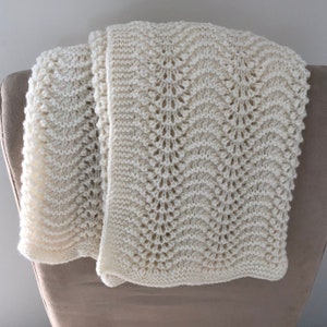Hand knitted pram blanket, lap rug, feather & fan pattern, green, white, pink, grey, blush