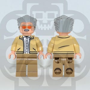 May include: Two plastic minifigures featuring a character with gray hair, orange-tinted glasses, a tan jacket over a white collared shirt with black buttons, and tan trousers. The figures are shown from both the front and back views.