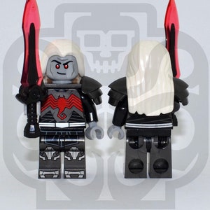 May include: A black and gray Lego minifigure with a red sword and white hair. The minifigure is wearing black armor and a red and black spider symbol on its chest.