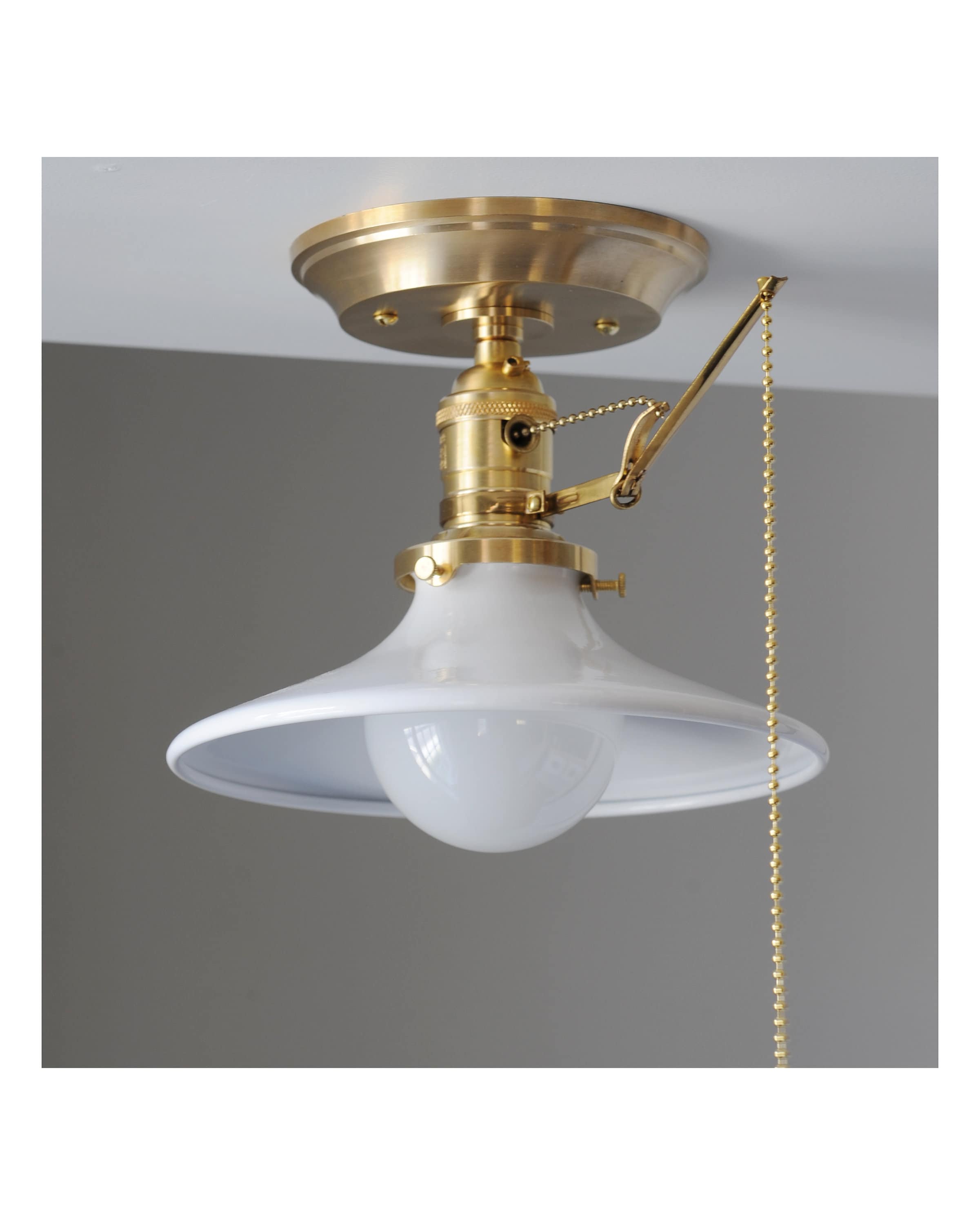 Unlacquered outlet brass chandelier