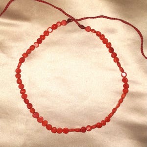 Antique Tibetan Coral beads from the Qing dynasty (year 1900) period, genuine untreated Corallium rubrum species, coin shaped side drilled