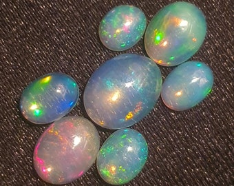 Crystal Clear Opal//7 piece set//Southern Ethiopian, hydrated hydrophane opal cabochons//stabilized by natural river caves