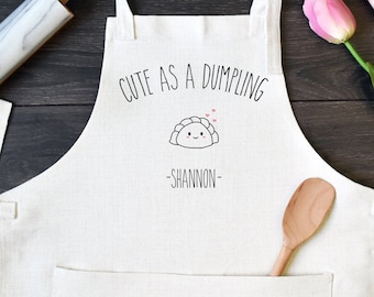 Delantal de cocina de lino personalizado, delantal para cocinar o hornear personalizado con bolsillo, delantal con diseño de bola de masa hervida, lindo como una bola de masa hervida con nombre