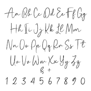 May include: A complete handwritten alphabet and numbers 1-0 in a cursive font. The letters are in uppercase and lowercase, with the ampersand and plus sign included. The font is a thin, elegant script style.