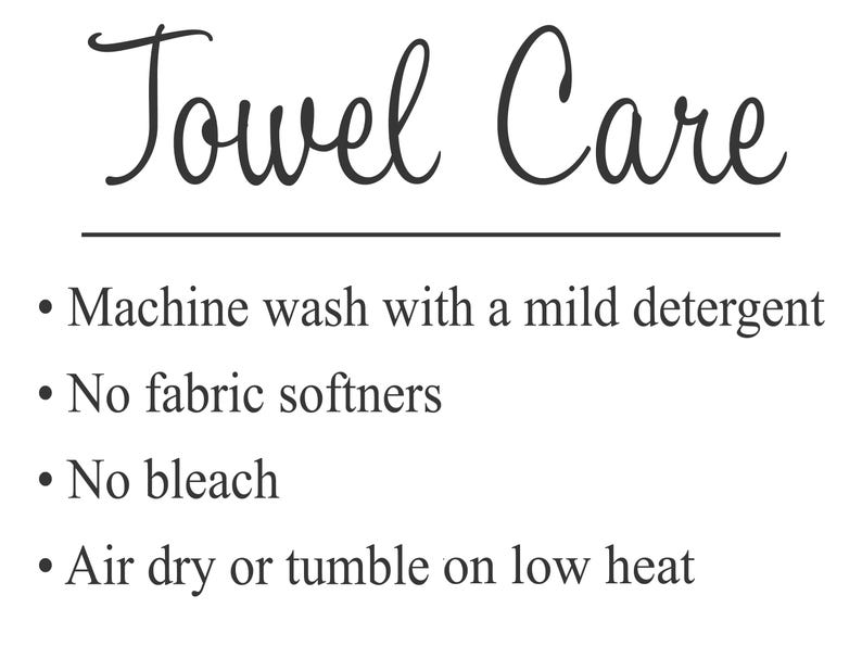 May include: White background with the words "Towel Care" in a cursive font. Below, bullet points list care instructions: machine wash with mild detergent, no fabric softeners, no bleach, and air dry or tumble on low heat.