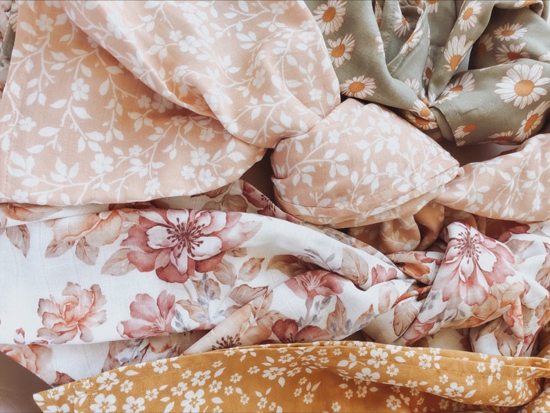 Fall floral muslin swaddle collection showing all 4 beautiful lightweight swaddle blankets perfect for fall/autumn