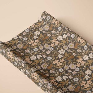 Adorable baby girl nursery decor. A stunning eclectic floral changing pad cover.