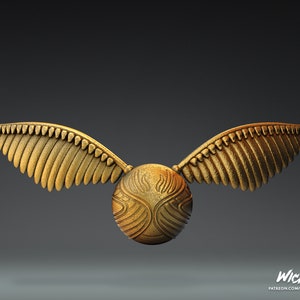 Escultura de la Snitch Dorada de Harry Potter