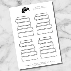 May include: Printable sheet with four black and white outlines of stacks of books. The text "Mini Book Stacks" and "DesignerChameleon.com" is at the top of the sheet. The text "Share on Instagram and tag @DesignerChameleon" is at the bottom of the sheet.