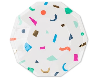 May include: White octagonal paper plate decorated with colorful geometric shapes in blue, pink, orange, green, and gold. The plate has a simple, modern design, suitable for parties or everyday use.