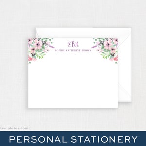 May include: A white card with a floral border and the text "SBK Sophie Katherine Brown" in purple lettering. The card is for personal stationery.