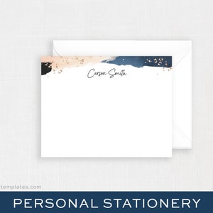 May include: White stationery with a watercolor design in shades of navy, blush, and black, accented with gold flecks. The name "Carson Smith" is written in elegant script. Includes a white envelope. The words "PERSONAL STATIONERY" are at the bottom.