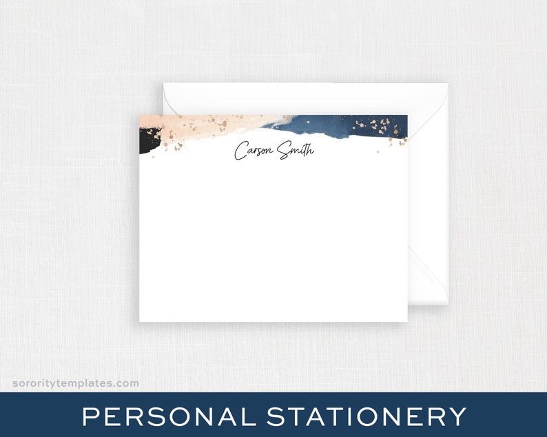 May include: White stationery with a watercolor design in shades of navy, blush, and black, accented with gold flecks. The name "Carson Smith" is written in elegant script. Includes a white envelope. The words "PERSONAL STATIONERY" are at the bottom.