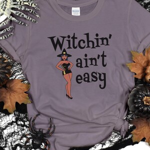 Witchin&#39; Ain&#39;t Easy | Pin-up Witch with Hat | Halloween Shirt |