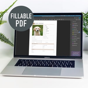 K&ouml;nnte beinhalten: Ein Laptop-Computer zeigt ein ausf&uuml;llbares PDF-Dokument mit einem Welpenprofilformular an. Das Formular enth&auml;lt Felder f&uuml;r den Namen des Welpen, die Rasse, das Geburtsdatum und andere Informationen. Das Dokument ist in Adobe Acrobat Pro ge&ouml;ffnet.