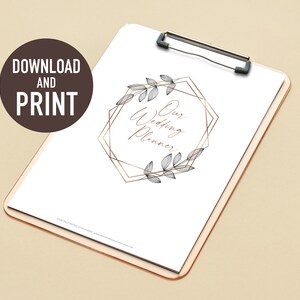 May include: A printable wedding planner with a gold geometric frame and floral accents. The text "Our Wedding Planner" is written in cursive inside the frame.