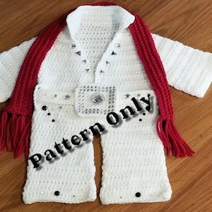 May include: White crocheted baby outfit with a red scarf, resembling Elvis Presley's iconic jumpsuit. The outfit features a rhinestone belt and a sequined design on the front. The text 'Pattern Only' is superimposed on the image.