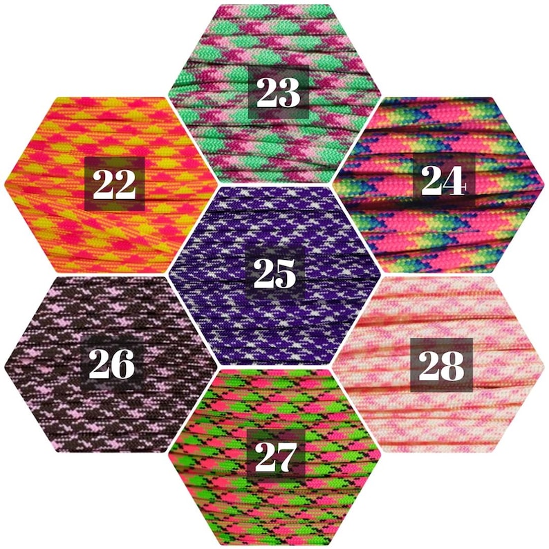 May include: A hexagonal display of eight different patterned paracord ropes, numbered 22 through 28. Each rope is a different color combination, including pink, purple, green, yellow, and brown.