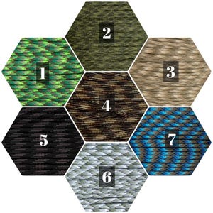 May include: Seven different colors of paracord, each in a hexagonal shape. The colors are green, brown, tan, black, white, blue, and a green and brown camouflage pattern.