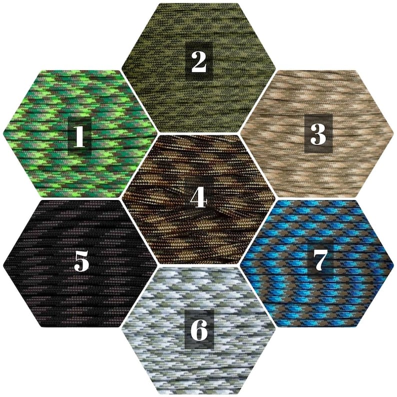 May include: Seven different colors of paracord, each in a hexagonal shape. The colors are green, brown, tan, black, white, blue, and a green and brown camouflage pattern.