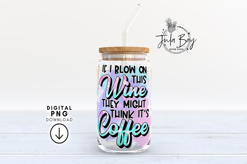May include: A clear glass jar with a wooden lid and a clear straw. The jar has a colorful design with the text "IF I BLOW ON THIS Wine THEY MIGHT THINK IT'S Coffee". The design includes pink, blue, and purple watercolor-style splashes.