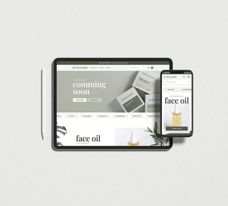 May include: A tablet and smartphone display a website with the text "coming soon" and "face oil." The website features a minimalist design with green and white elements. A stylus and a sprig of greenery are also present.