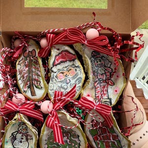 Handgeschilderde oesterschelpornamenten